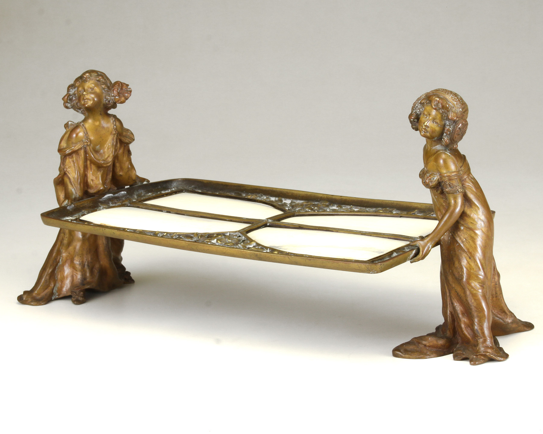 Carl Kauba Austrian, (1865 - 1922) Pair of Young Girls Holding a Reticulated Tray or Holder